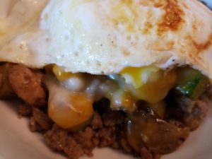 Keto Sausage Vegetable Breakfast Bowl with an egg on top